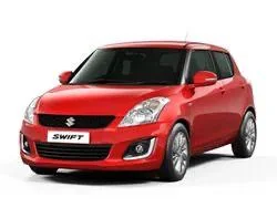 Red Suzuki Swift compact car